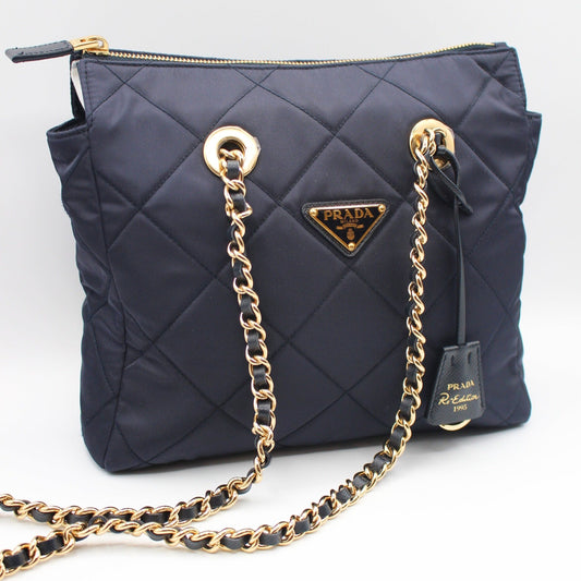 Prada Enameled Metal Triangle Re-Edition 1995