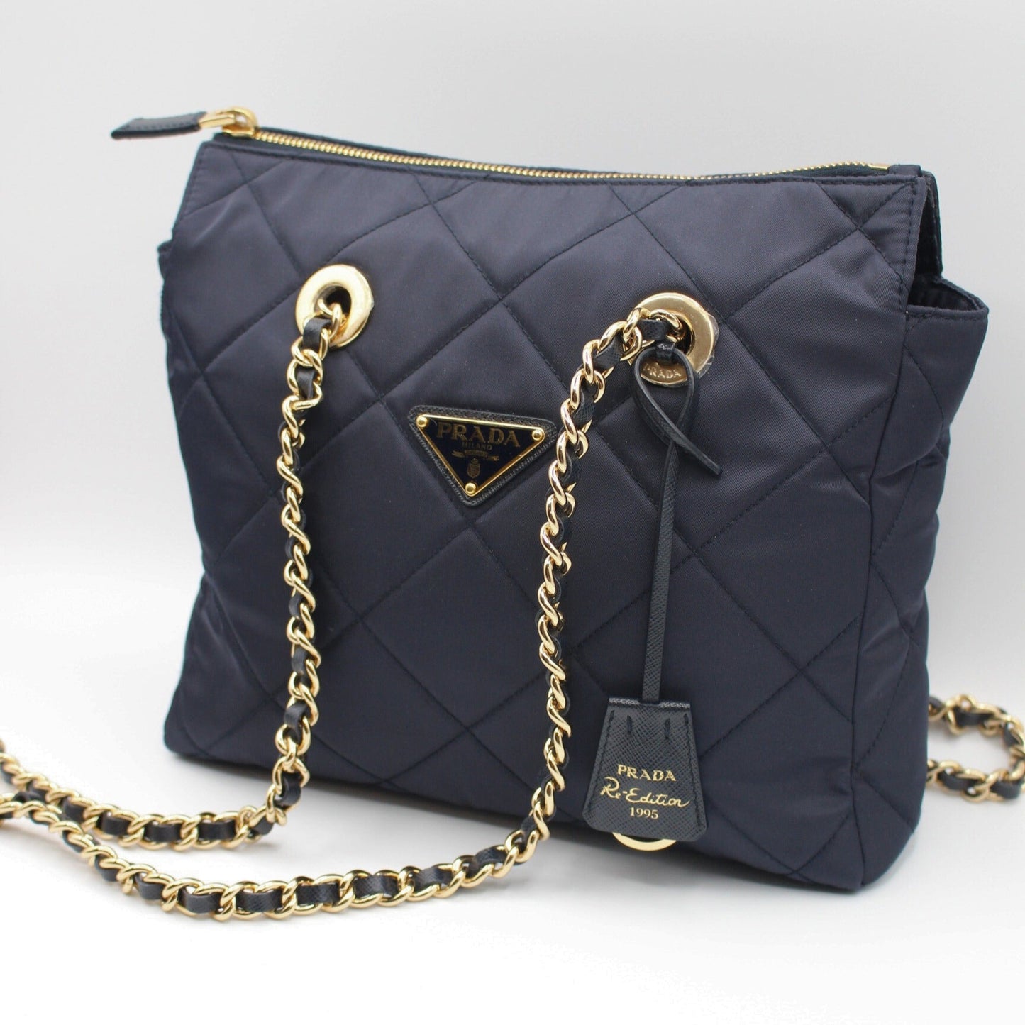 Prada Enameled Metal Triangle Re-Edition 1995