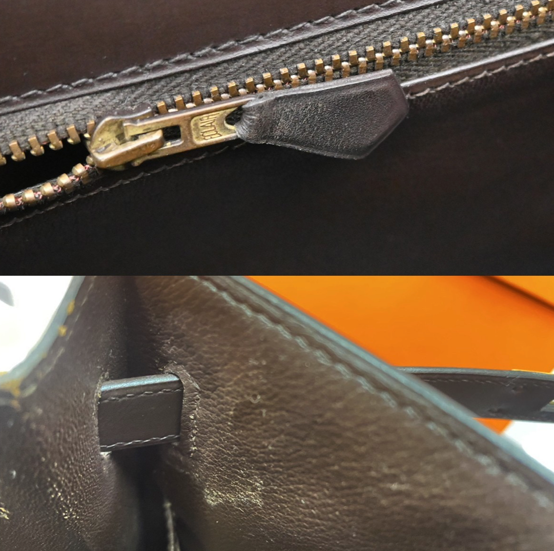 Close-up of a black leather bag with a gold zipper.