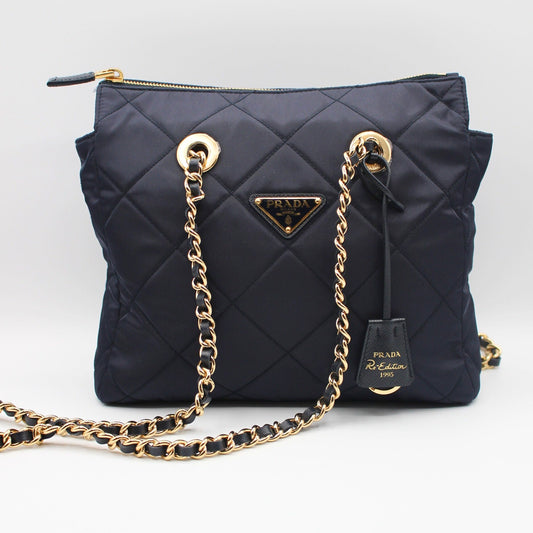 Prada Enameled Metal Triangle Re-Edition 1995